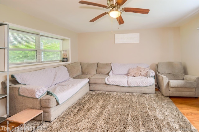 166 Indian Trl, Columbiaville, MI 48421 - living room with wood finished floors and a ceiling fan