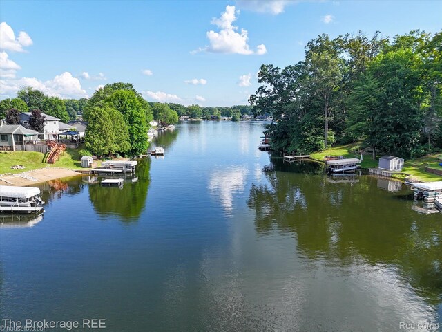 166 Indian Trl, Columbiaville, MI 48421 - water view featuring a boat dock