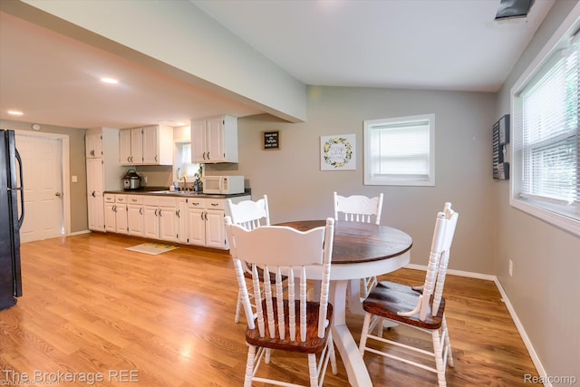 166 Indian Trl, Columbiaville, MI 48421 - dining room with light wood-style floors and recessed lighting