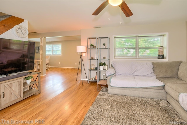 166 Indian Trl, Columbiaville, MI 48421 - living room with light wood-type flooring and ceiling fan