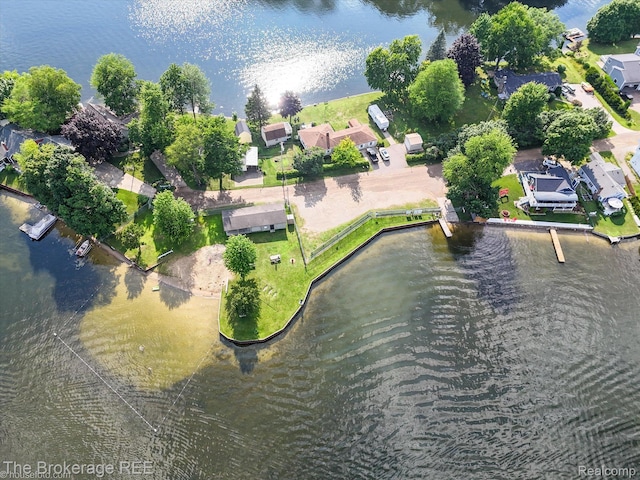 166 Indian Trl, Columbiaville, MI 48421 - aerial view of property and surrounding area with a nearby body of water and nearby suburban area