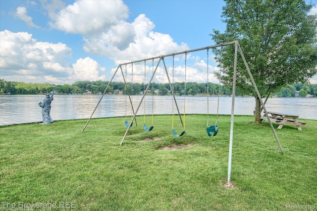 166 Indian Trl, Columbiaville, MI 48421 - view of playground with a yard