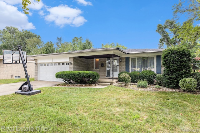 3408 Ardmore Dr, Troy, MI 48083 - ranch-style house featuring brick siding, concrete driveway, an attached garage, and a front lawn