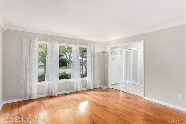 3408 Ardmore Dr, Troy, MI 48083 - spare room featuring wood finished floors and crown molding