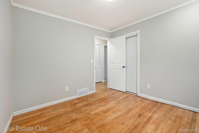 3408 Ardmore Dr, Troy, MI 48083 - spare room featuring wood finished floors and ornamental molding