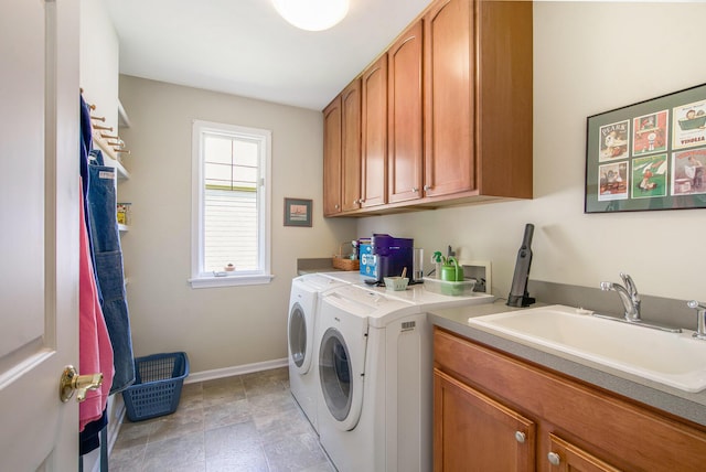 2736 Aspen Ct, Ann Arbor, MI 48108 - laundry area featuring washer and clothes dryer and cabinet space