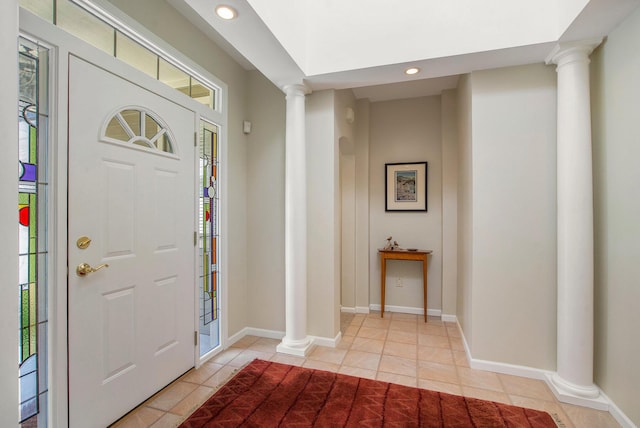 2736 Aspen Ct, Ann Arbor, MI 48108 - entrance foyer with ornate columns, light tile patterned floors, and recessed lighting