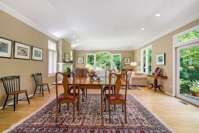 2736 Aspen Ct, Ann Arbor, MI 48108 - dining space with light wood-style floors, crown molding, and recessed lighting