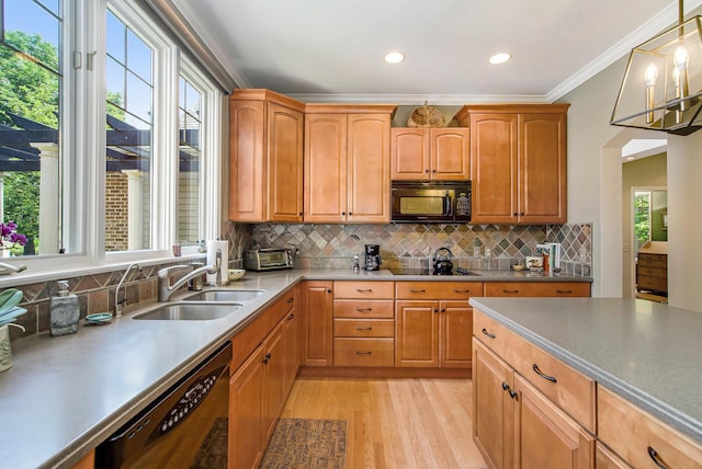 2736 Aspen Ct, Ann Arbor, MI 48108 - kitchen featuring black appliances, light wood finished floors, ornamental molding, pendant lighting, and backsplash