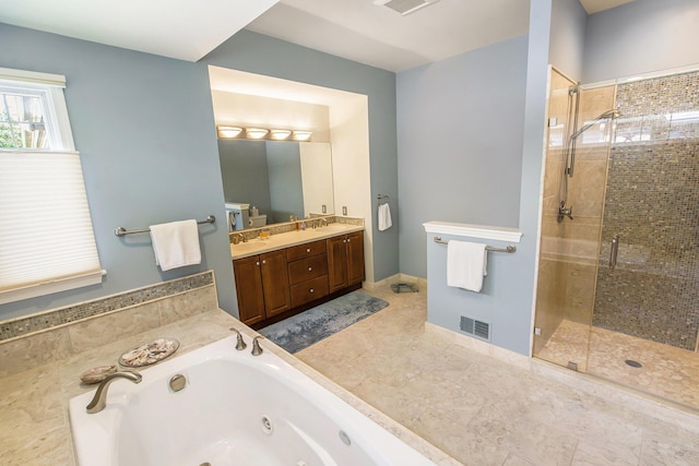 2736 Aspen Ct, Ann Arbor, MI 48108 - full bathroom with a shower stall, a tub with jets, and double vanity