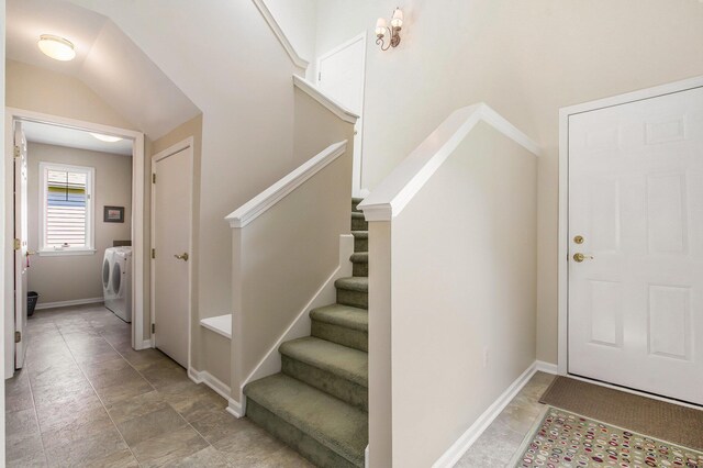 2736 Aspen Ct, Ann Arbor, MI 48108 - stairway featuring washer / clothes dryer and baseboards