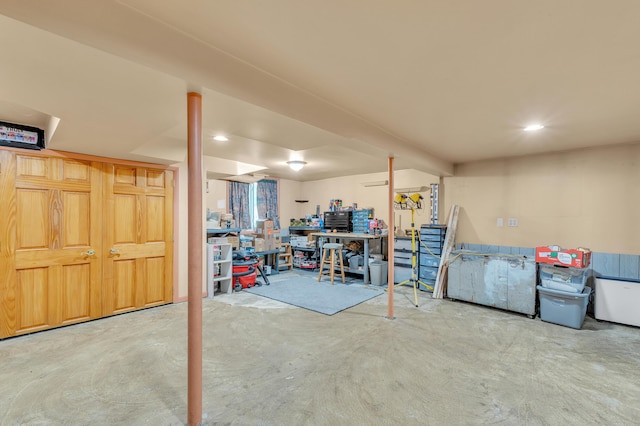 2050 S Wagner Rd, Ann Arbor, MI 48103 - finished below grade area with a workshop area and recessed lighting