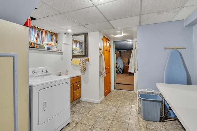 2050 S Wagner Rd, Ann Arbor, MI 48103 - laundry area featuring washer / clothes dryer and cabinet space