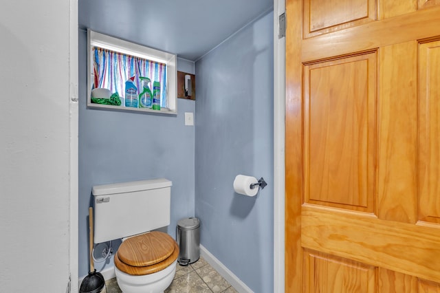 2050 S Wagner Rd, Ann Arbor, MI 48103 - bathroom with toilet and tile patterned flooring