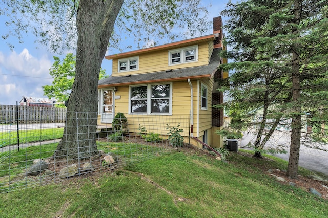 2050 S Wagner Rd, Ann Arbor, MI 48103 - view of front facade featuring a chimney