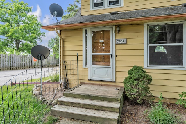 2050 S Wagner Rd, Ann Arbor, MI 48103 - doorway to property with a shingled roof