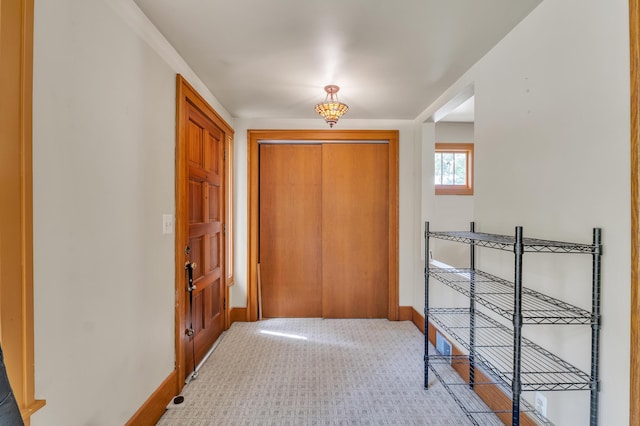 2050 S Wagner Rd, Ann Arbor, MI 48103 - entrance foyer with baseboards and light colored carpet