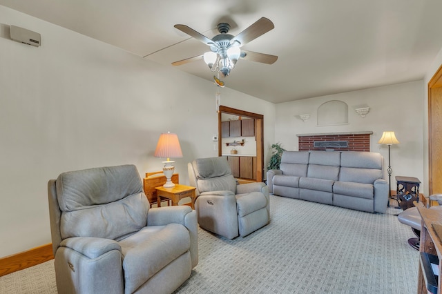 2050 S Wagner Rd, Ann Arbor, MI 48103 - living area featuring ceiling fan, light carpet, and a fireplace