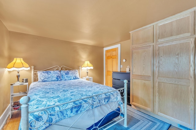 2050 S Wagner Rd, Ann Arbor, MI 48103 - bedroom featuring light wood-style floors and a closet