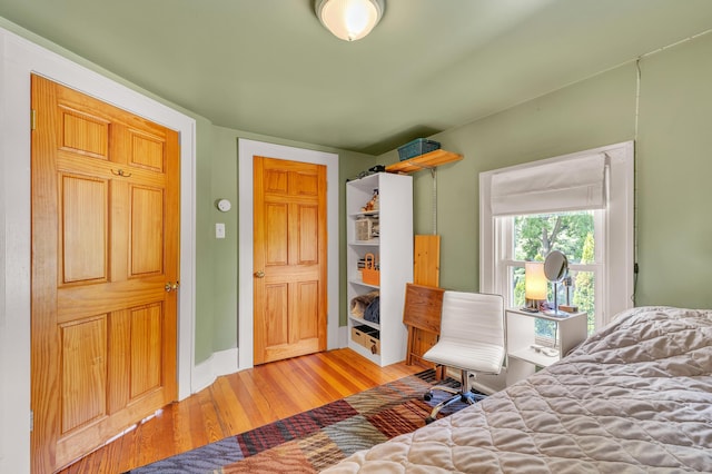 2050 S Wagner Rd, Ann Arbor, MI 48103 - bedroom with wood finished floors and baseboards