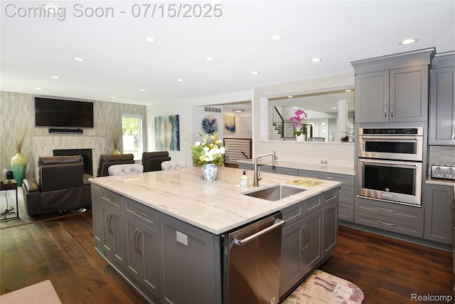 591 Wallace St, Birmingham, MI 48009 - kitchen featuring gray cabinets, stainless steel appliances, recessed lighting, a center island with sink, and dark wood finished floors