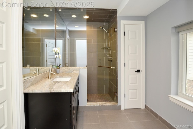 591 Wallace St, Birmingham, MI 48009 - full bath featuring a shower stall, vanity, tile patterned flooring, healthy amount of natural light, and recessed lighting