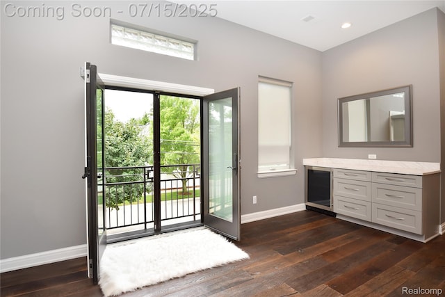 591 Wallace St, Birmingham, MI 48009 - doorway with wine cooler, dark wood finished floors, and recessed lighting