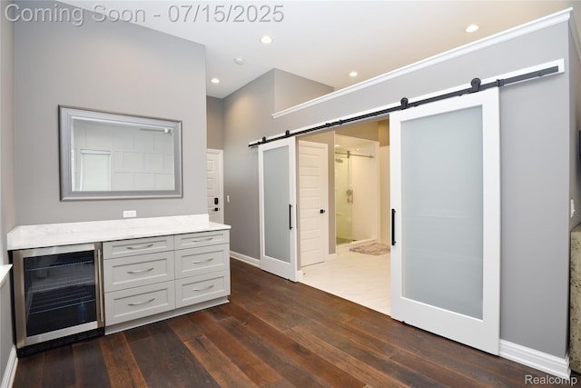 591 Wallace St, Birmingham, MI 48009 - full bath featuring wine cooler, wood-type flooring, a shower stall, vanity, and recessed lighting