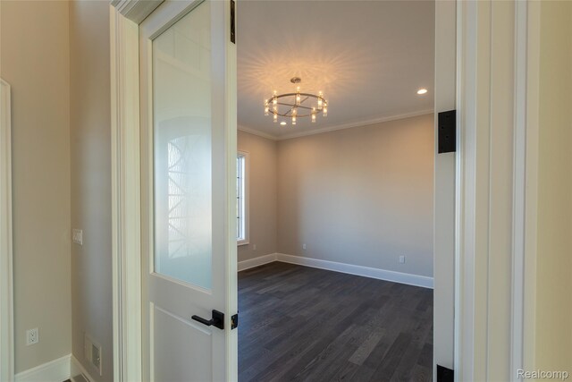 2599 Forest Glen Ct, Rochester, MI 48306 - empty room with a chandelier, dark wood-type flooring, ornamental molding, and recessed lighting