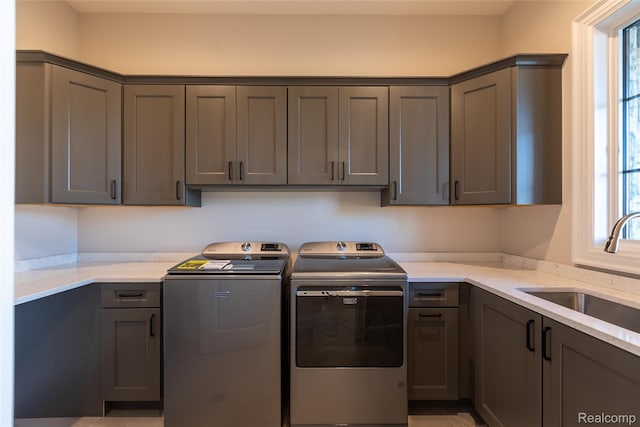 2599 Forest Glen Ct, Rochester, MI 48306 - washroom with separate washer and dryer and cabinet space