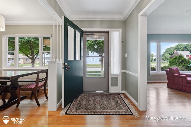 501 Lafayette St, Flint, MI 48503 - entryway with light wood-style flooring and crown molding