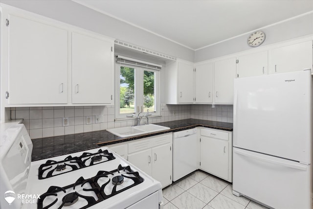 501 Lafayette St, Flint, MI 48503 - kitchen featuring white appliances, white cabinets, decorative backsplash, and dark countertops