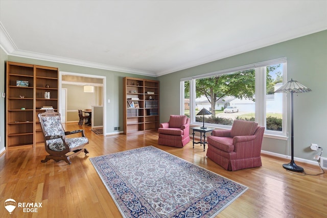 501 Lafayette St, Flint, MI 48503 - sitting room with wood finished floors and crown molding