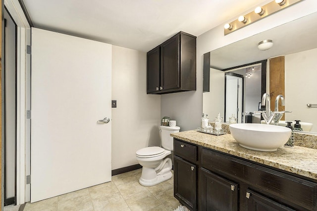 940 Monroe Ave NW Unit 416, Grand Rapids, MI 49503 - bathroom featuring vanity and tile patterned flooring