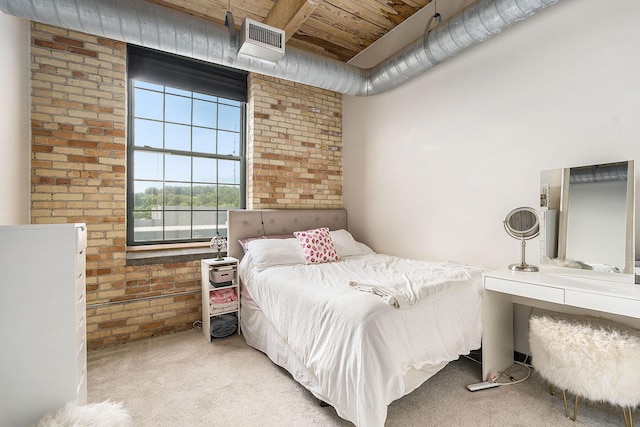940 Monroe Ave NW Unit 416, Grand Rapids, MI 49503 - carpeted bedroom with brick wall and wooden ceiling