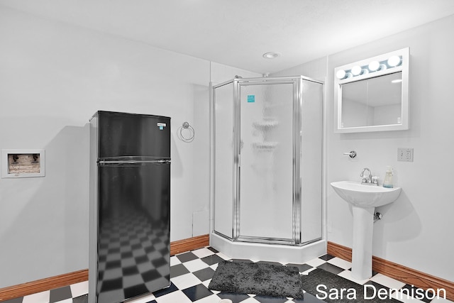 1026 Alan St, Fremont, MI 49412 - full bathroom with tile patterned floors and a shower stall