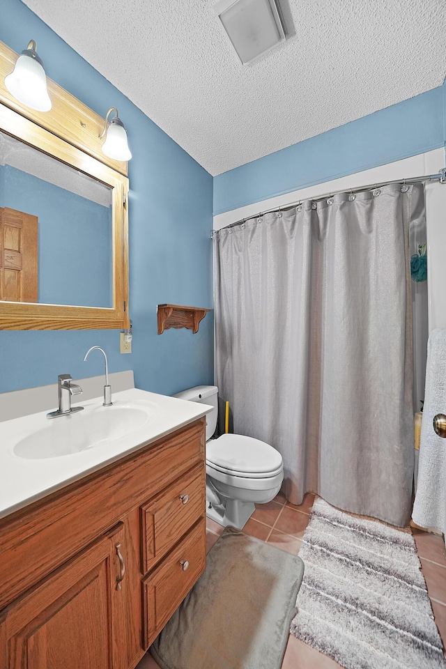 1026 Alan St, Fremont, MI 49412 - full bath with vanity, tile patterned floors, a textured ceiling, and curtained shower