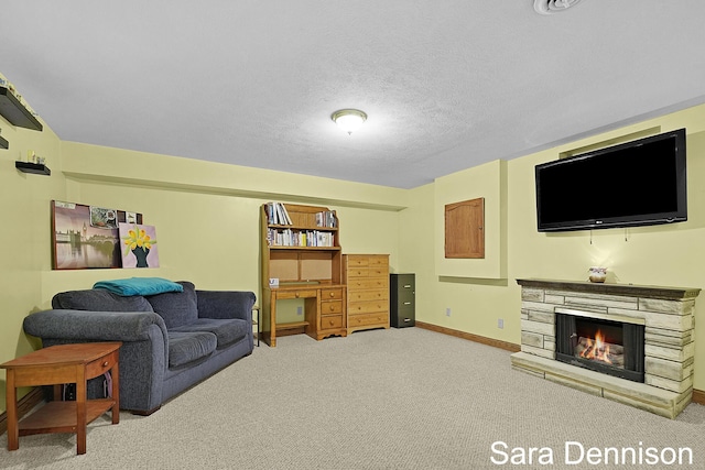 1026 Alan St, Fremont, MI 49412 - carpeted living room featuring a stone fireplace and a textured ceiling