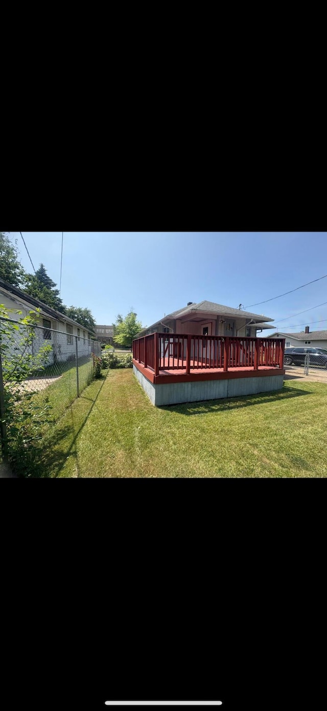 863 Colfax Ave, Benton Harbor, MI 49022 - fenced backyard with a deck