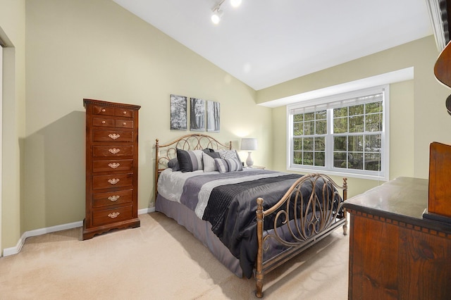 4273 Sawkaw Dr NE, Grand Rapids, MI 49525 - bedroom featuring light colored carpet and high vaulted ceiling