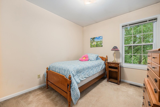 4273 Sawkaw Dr NE, Grand Rapids, MI 49525 - bedroom with light colored carpet and multiple windows
