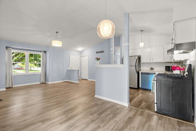 24690 Bashian Dr, Novi, MI 48375 - kitchen featuring stainless steel appliances, lofted ceiling, white cabinetry, extractor fan, and light countertops