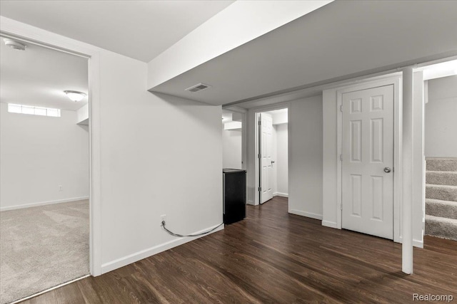 24690 Bashian Dr, Novi, MI 48375 - finished below grade area with dark wood finished floors and stairway
