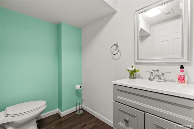 24690 Bashian Dr, Novi, MI 48375 - half bathroom with vanity and wood finished floors