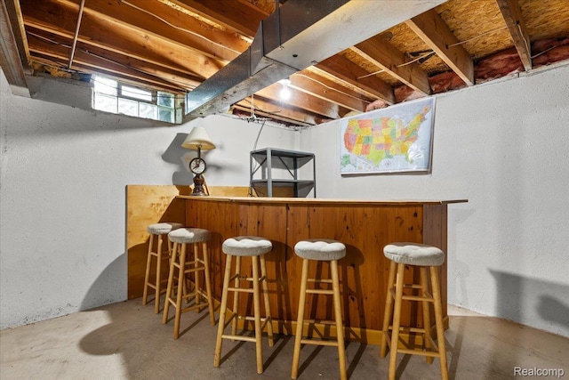 24690 Bashian Dr, Novi, MI 48375 - indoor dry bar with unfinished concrete floors