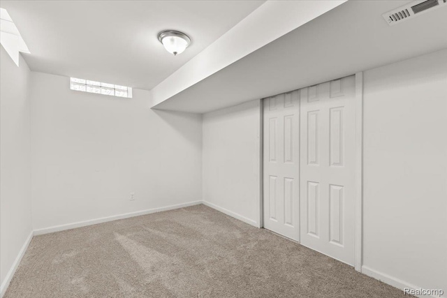 24690 Bashian Dr, Novi, MI 48375 - below grade area with carpet floors and baseboards