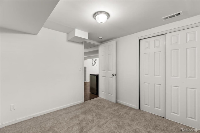 24690 Bashian Dr, Novi, MI 48375 - unfurnished bedroom featuring carpet flooring and a closet