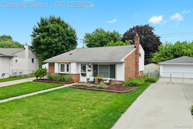 1450 N Stephen Ave, Clawson, MI 48017 - view of front of house featuring brick siding, a detached garage, a gate, a chimney, and an outdoor structure
