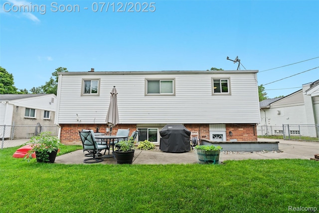1450 N Stephen Ave, Clawson, MI 48017 - back of house with brick siding and a patio
