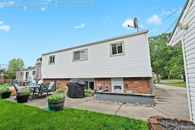 1450 N Stephen Ave, Clawson, MI 48017 - rear view of property with a patio and brick siding